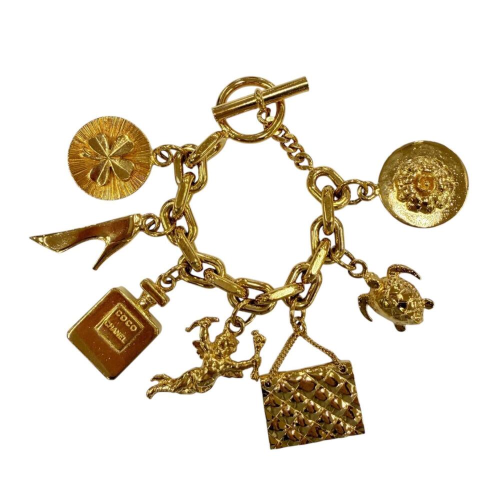 CHANEL Vintage Metal Icon Charm 7-Strand Bangle Bracelet, Gold, Weight 205g, ... - Picture 6 of 9